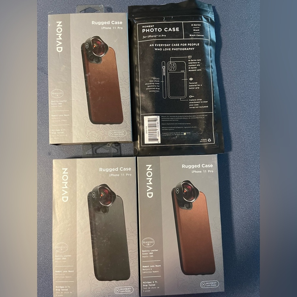 Three NOMAD Leather I Phone 11 Pro Cases plus Moment Black Photo Case